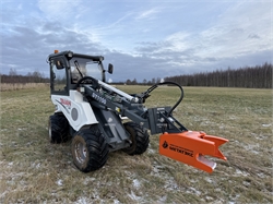Обрезчик деревьев на мини погрузчик Taian 10705